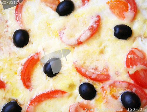 Image of Omelette with tomatoes, black olives and cheese 