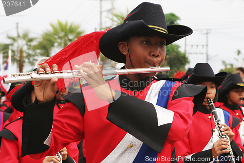 Image of Thai student plays the flute during a parade in Phuket, Thailand