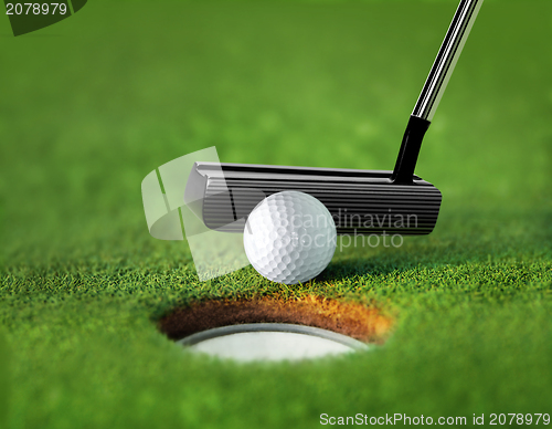 Image of closeup golf ball and tee