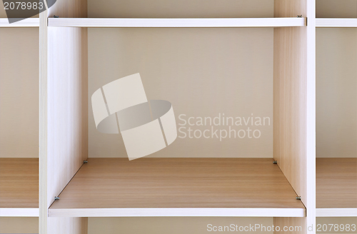 Image of empty wooden shelf