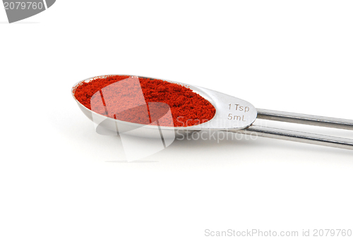 Image of Smoked paprika powder measured in a metal teaspoon