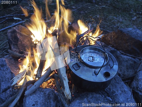 Image of campfire and coffe