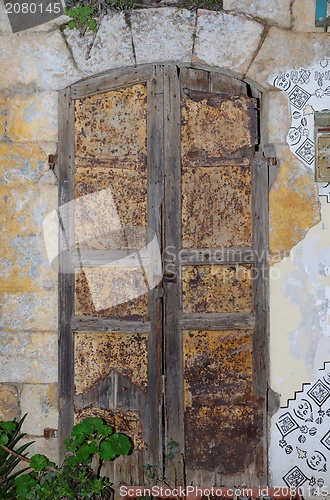 Image of Closed door of an old house