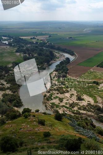 Image of Guadalquivir river seen from the tower of Almodovar Del Rio castle in Andalusia, Spain