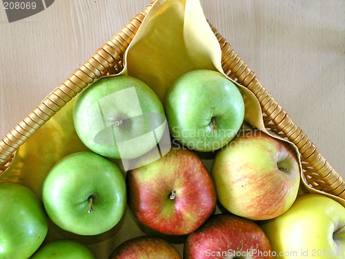 Image of red, green and yellow apples