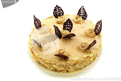 Image of Coffee cake with chocolate decoration.