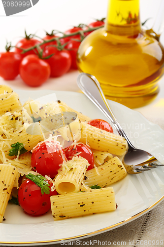 Image of Italian pasta with tomatoes.