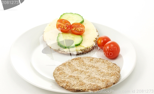 Image of Crackers on plate, with cheese