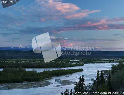 Image of Sunset colors on clouds over Alaska range