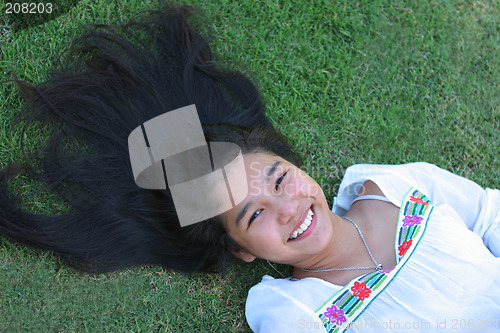 Image of Asian girl with a wide smile