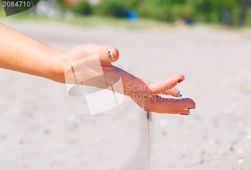 Image of Sand through hand