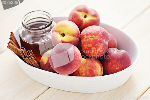 Image of peaches with honey and cinnamon