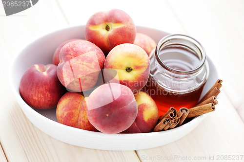 Image of peaches with honey and cinnamon