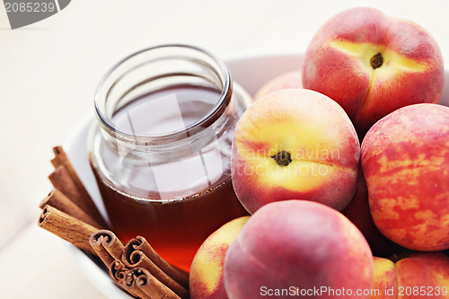 Image of peaches with honey and cinnamon