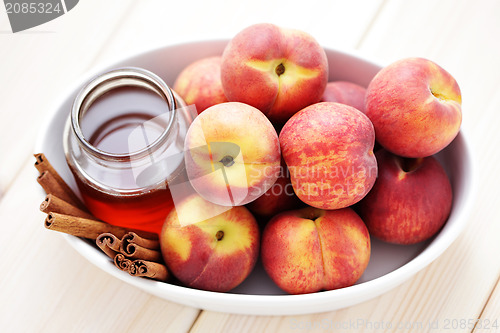 Image of peaches with honey and cinnamon