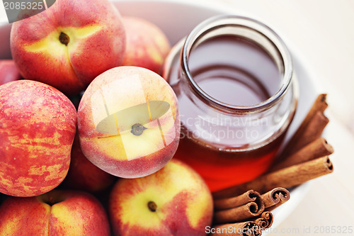 Image of peaches with honey and cinnamon