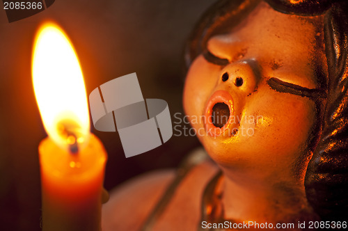 Image of angel with candle