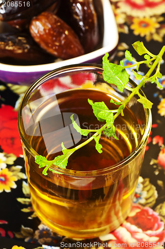 Image of peppermint tea with leaves