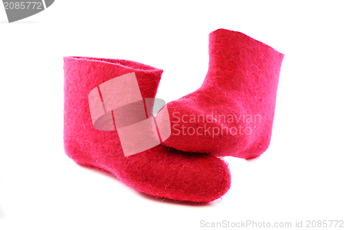 Image of Bright pink felt boots. 