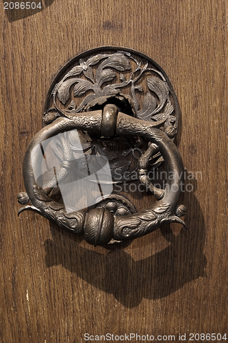 Image of knocker in a door in innsbruck