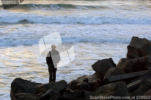 Image of Woman Contemplates the Waves, South Jetty