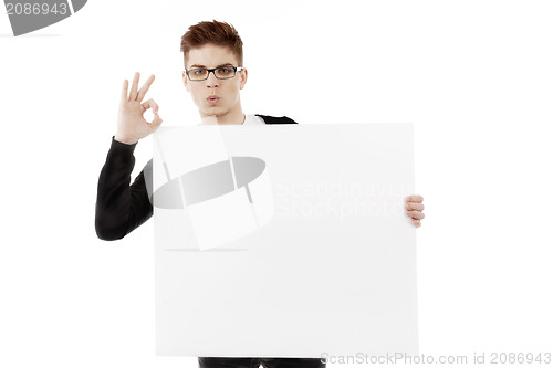 Image of Young man with a blank baner