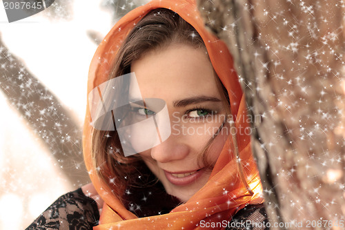 Image of Beautiful young smiling woman