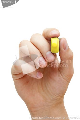 Image of Hand Holding Yellow Marker