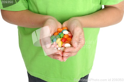 Image of Hands holding lollies