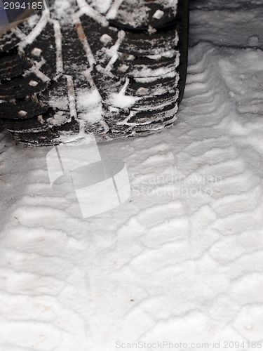 Image of Car tire on snow