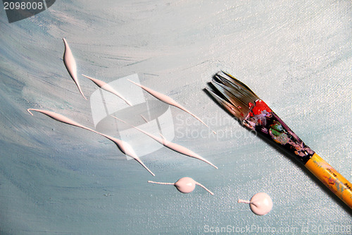 Image of Beautiful oil painting and paintbrush 