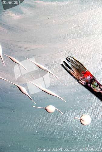 Image of Oil picture and paintbrush