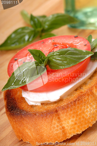 Image of Bruschetta with tomato, mozzarella and basil