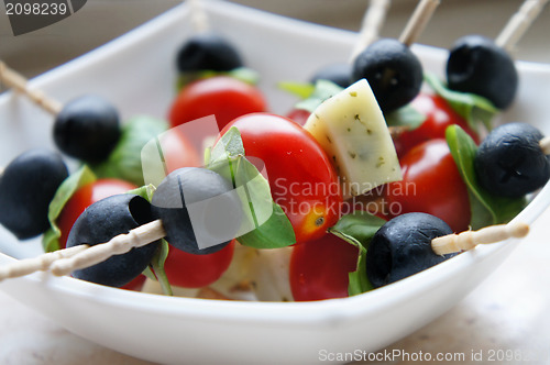 Image of Olives and cherry tomatoes on the stick