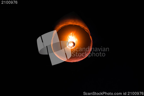 Image of Single floating paper lantern during festival in Thailand 