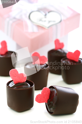 Image of Handmade chocolates with hearts.