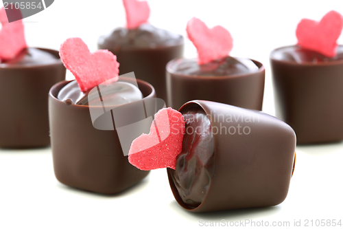 Image of Candy with red hearts closeup. 