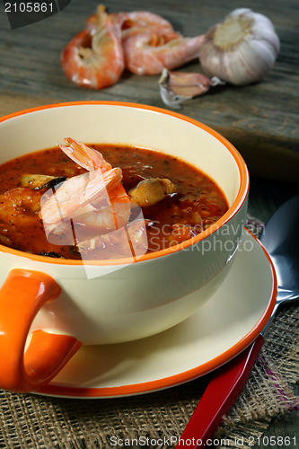 Image of Tomato soup with seafood.