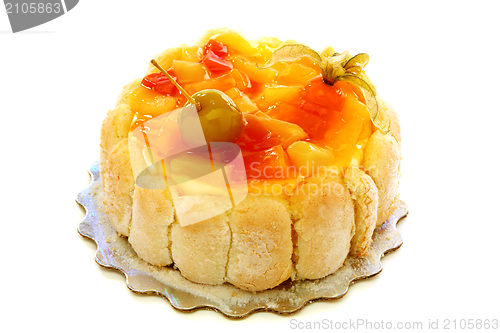 Image of Sponge cake with pineapple and peaches.