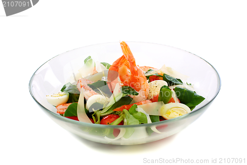Image of Salad with eggs, shrimp and cheese in glass bowl