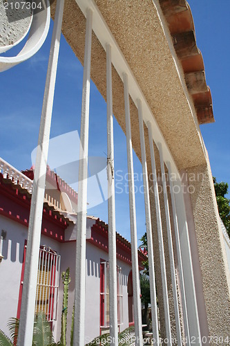 Image of Grasshopper sitting on gate