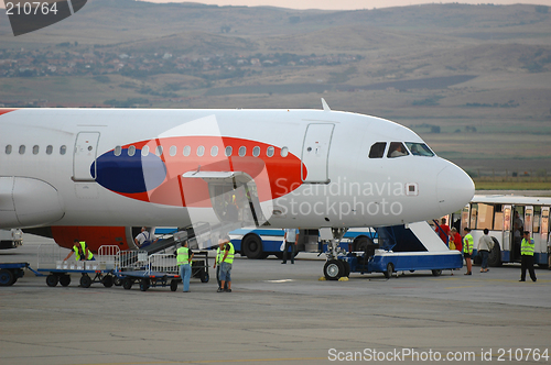 Image of Workers and plane