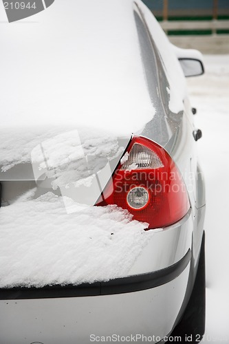 Image of Car covered snow.
