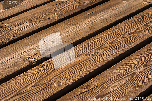 Image of Closeup photo of wooden floor panels