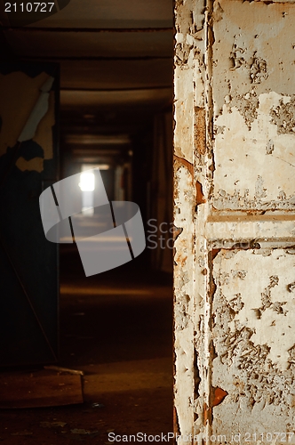 Image of Dark corridor with painted door