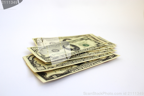 Image of dollar banknotes isolated on a white background