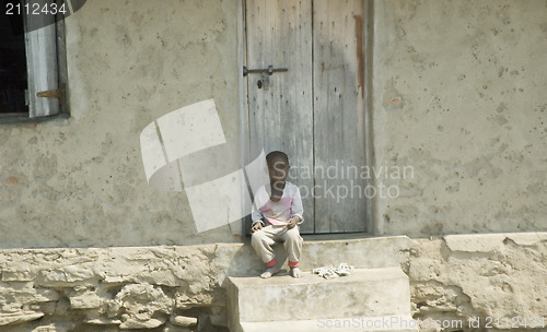 Image of Boy sitting