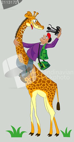 Image of Giraffe and photographer