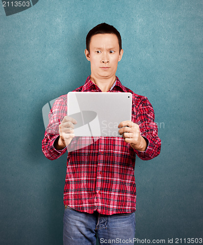 Image of Asian Man With Touch Pad