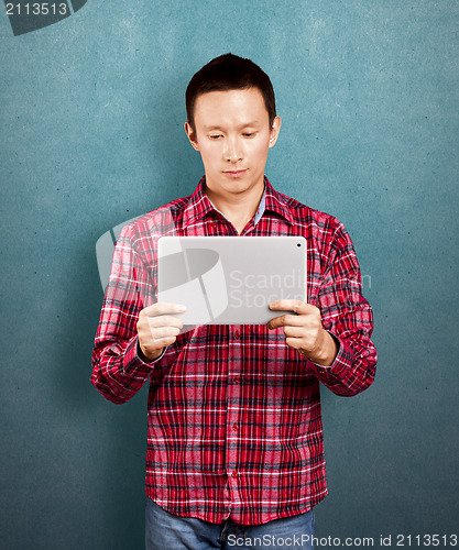 Image of Asian Man With Touch Pad